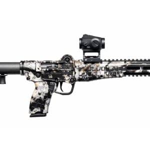 Camouflage-pattern tactical rifle in profile with a red-dot sight mounted on the top rail and a folding stock at the rear.