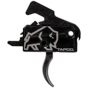 Black Tapco trigger lever with a silver wolf graphic on a black housing.