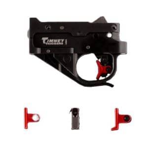 Black Timney Triggers drop-in trigger assembly with a red trigger and three red installation components.
