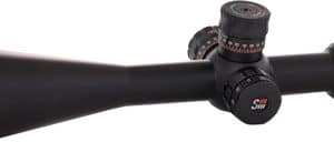 Rifle scope with adjustable turrets and eyepiece, viewed from the side