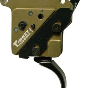 Bronze Timney Triggers rifle trigger mechanism with a black curved trigger and lever assembly visible against a light background.