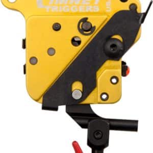Yellow Timney Triggers firearm trigger assembly with black mounting bar and red safety lever on a white background (adjustable rifle trigger)
