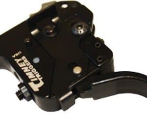 Close-up of a black bicycle brake/shift lever assembly with a curved lever and mounting hardware on the left side of the handlebar