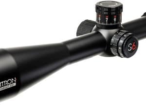 Rifle scope with adjustable turrets and a large objective lens, labeled Sightron, angled to show eyepiece and objective.