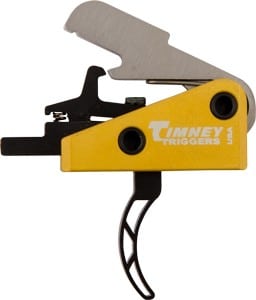Yellow Timney Triggers firearm trigger mechanism with black components and metal trigger guard, shown in side view.