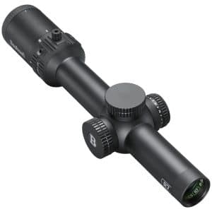 Black rifle scope with knurled adjustment knobs and lens end caps, branded Bushnell, shown at an angle.