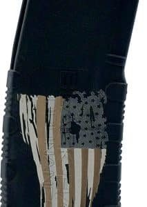 Black firearm magazine with a torn American flag decal on its side.