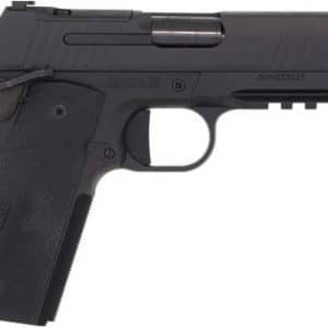 Side view of a black semi-automatic pistol with textured grip on a white background