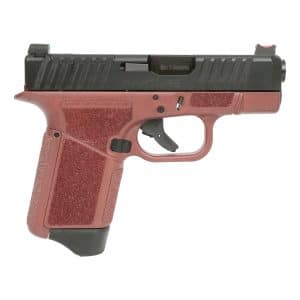 Side view of a semi-automatic pistol with a red textured grip and black slide, trigger visible.