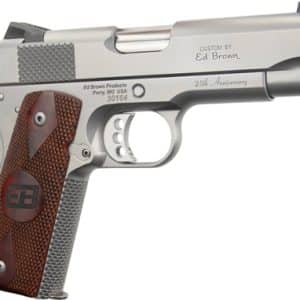 Custom-edition semi-automatic pistol with brown checkered wood grip, engraved slide reading 'Custom by Ed Brown'.