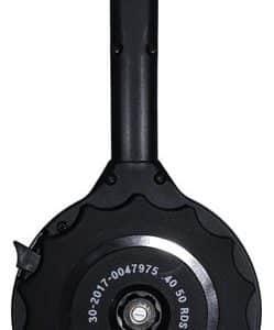 Handheld tool with a round, toothed base and a long black handle; base shows markings and several screws, suggesting an adjustment or measuring device.