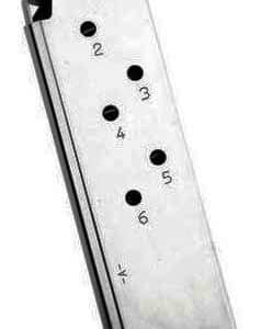 Metal pistol magazine leaning to the left, showing six round holes labeled 2 through 6 on its side.