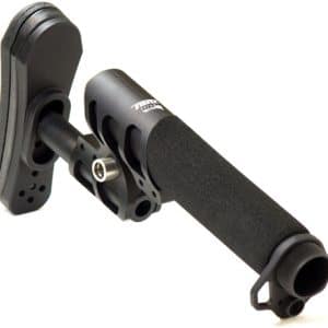 Handheld microphone with foam windscreen on a shock-mounted grip for cameras or video work.