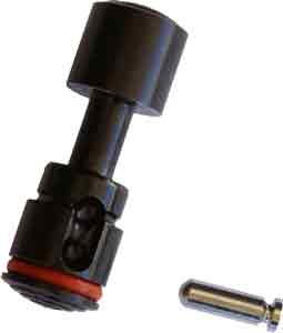 Black pneumatic air quick-connect fitting with a red seal and a separate metal valve core nearby