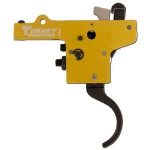 Yellow Timney Triggers firearm trigger mechanism with lever and screws (close-up)