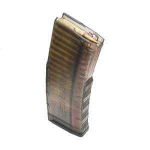 Transparent rifle magazine filled with visible copper-jacketed rounds inside a clear body.
