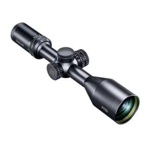 Rifle scope with adjustable turrets and large objective lens on a white background (Bushnell R5 model).