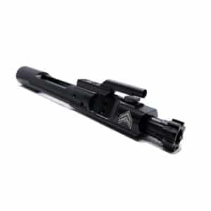 Close-up of a black pistol slide with rails and front sight, shown from a side angle.