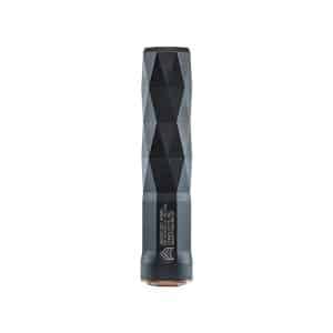 Faceted, cylindrical tool or device standing upright with a dark, diamond-cut pattern and a copper-colored base edge