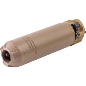 Tan firearm suppressor with attached muzzle device, shown in a close-up angled view with visible threading at the front.