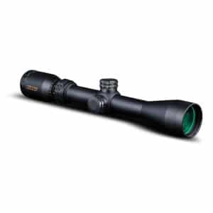 Black riflescope with a green-tinted front lens on a white background, angled to the right.