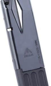Gray handheld desktop stapler shown from the side, resting on its built-in stand base for stability on a desk.