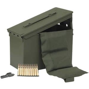 Olive-green military ammo box with lid open, a fabric pouch spilling out, and a belt of rifle cartridges nearby.