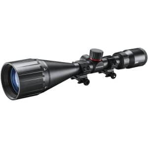 Long-range rifle scope with adjustable turrets and mounting rings for attachment to a rifle rail.