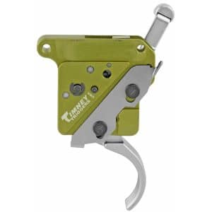 Olive green Timney Triggers rifle trigger assembly with silver levers and curved trigger.