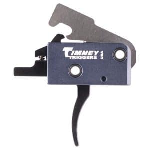 Close-up of a blue metal firearm trigger assembly with curved black trigger, labeled Tinney Triggers USA on the housing.