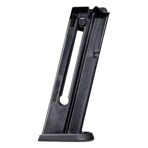 Black pistol magazine standing upright on its base plate, showing the rounded feed lips at the top and a release notch on the side