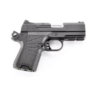 Side view of a gray semi-automatic pistol with a textured grip and rail-ready frame.