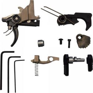Collection of disassembled bicycle derailleur parts and tools: two derailleur bodies, springs, screws, a pulley, and hex wrenches.