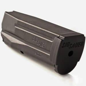 Black SIG Sauer 9mm handgun magazine resting on a white background, showing stamped markings.