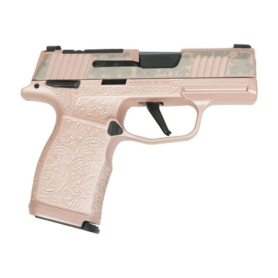 Pink engraved semi-automatic pistol with floral pattern and black trigger.