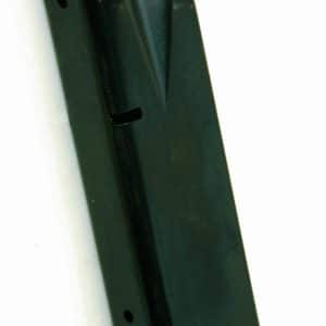Black pistol magazine (detachable ammo clip) viewed from side, with flat circular base plate at bottom