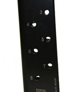 Black ProMag pistol magazine with numbered feed holes (3–8) and a protruding baseplate; Made in USA.