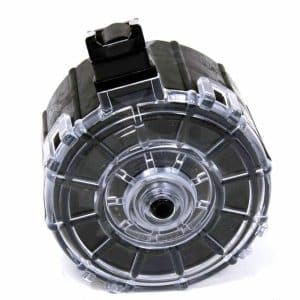 Transparent drum-style firearm magazine with a clear body and black feed mechanism on top.