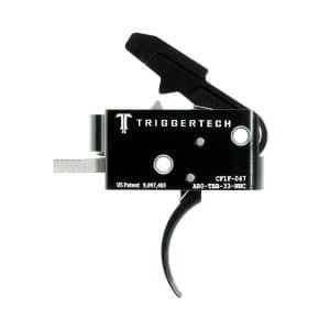 Black TriggerTech rifle trigger with lever and safety, shown from the side (side view).