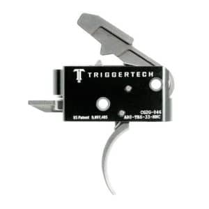 TriggerTech rifle trigger assembly with a curved silver trigger and two metal levers on a black housing.