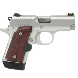 Side view of a silver 9mm semi-automatic pistol with a brown textured grip against a white background.