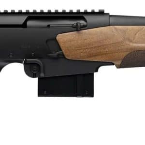Bolt-action hunting rifle with a wooden stock and long barrel, shown in profile on a white background.