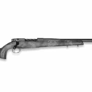 Long-barreled camouflage rifle with a polymer stock and muzzle brake, shown on a white background, barrel to the right.