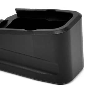 Black plastic battery–dock style housing with an open top slot, used to hold a battery or small component