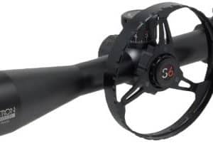 Black long-range riflescope with a circular scope ring around the midsection and a large objective lens at the front