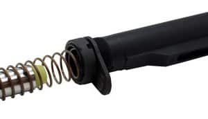 Automotive suspension shock absorber with exposed coil spring and piston rod.