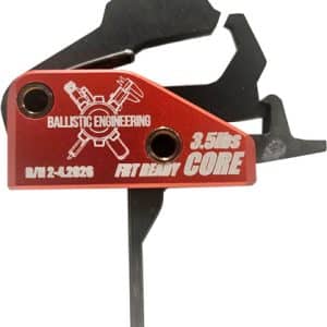 Red archery release aid with a black trigger mechanism, branding reading 'Ballistic Engineering' and '3.5 lbs CORE' on the red body, and a metal shooting arm extending from it.