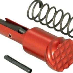 Red handheld tool featuring a coiled metal spring attached to a red body with textured end; appears to be a mechanical component or appliance tool with interchangeable bits.