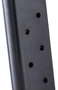 Black .45 ACP handgun magazine with five witness holes along the side and a curved body, shown at an angle.