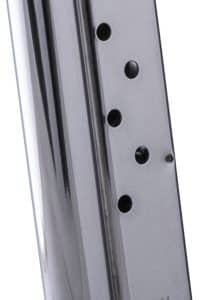 Metal 9mm pistol magazine with round-count holes along the side, shown in a vertical view.